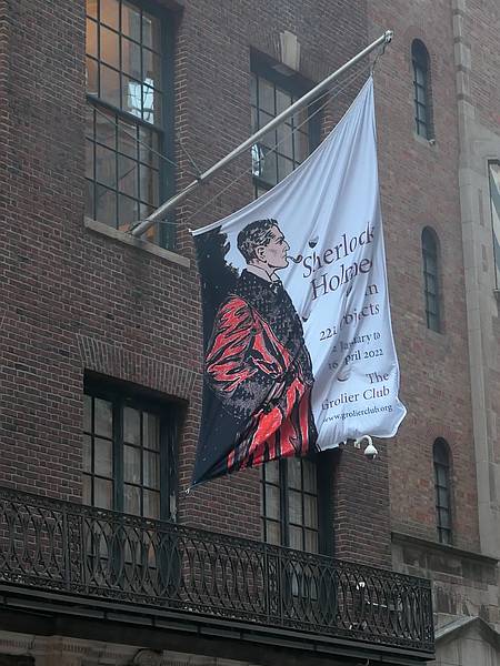 Sherlock Holmes exhibition flag outside of the Grolier Club